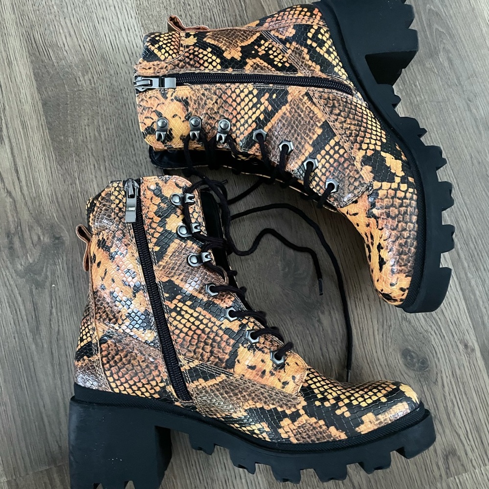 Snake skin zip up boots